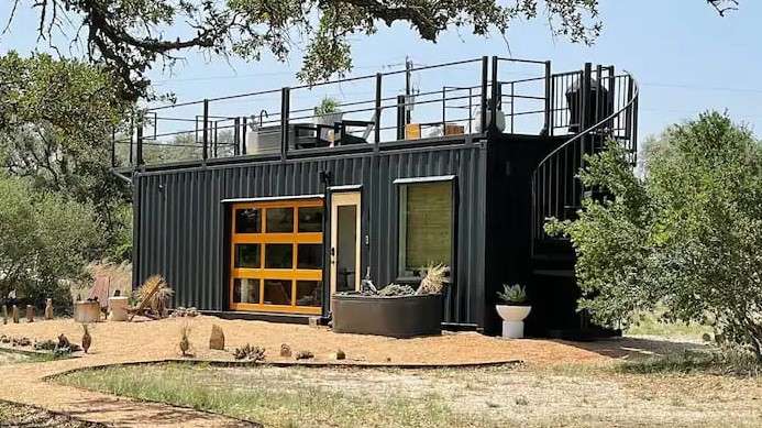 Shipping Container House with Roof Tub at Desert Rose Farm