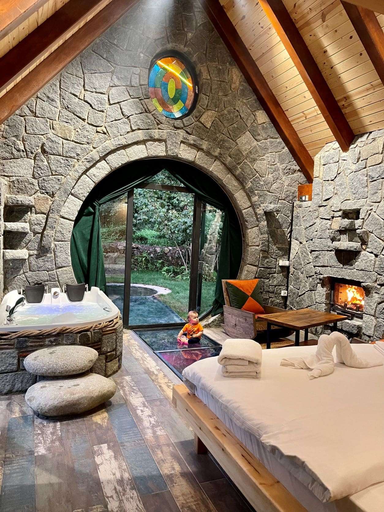 Tiny Stone House with Jacuzzi and Fireplace - Dream Tiny Living