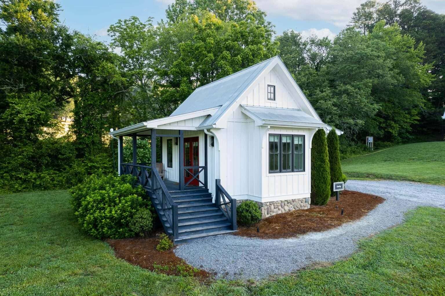 White Designed Tiny Highland House - Dream Tiny Living
